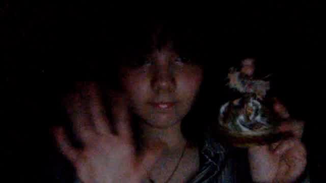 mentally unstable and retarded guy putting make up on his favorite doll