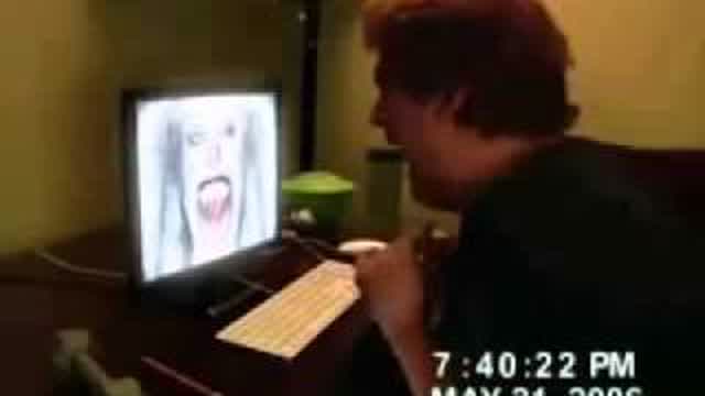 Guy punches through the monitor in FEAR Guy punches through the monitor in FEAR