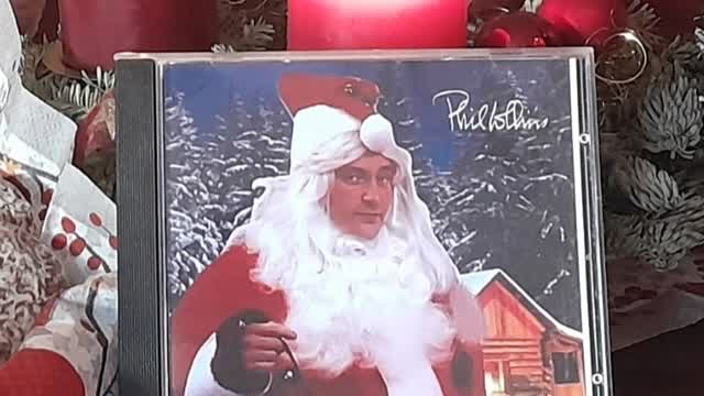 Advert for 'Year End's Diary', the new Phil Collins AI Christmas album!