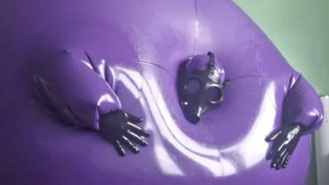 Overinflation of inflatable purple suit Overinflation of inflatable purple suit
